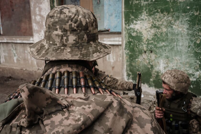 Ukrainian soldiers arrive at an abandoned building to rest and receive medical treatment after fighting on the front line for two months near Kramatorsk, eastern Ukraine on April 30, 2022. - Russia invaded Ukraine on February 24, 2022. (Photo by Yasuyoshi CHIBA / AFP) (Photo by YASUYOSHI CHIBA/AFP via Getty Images)