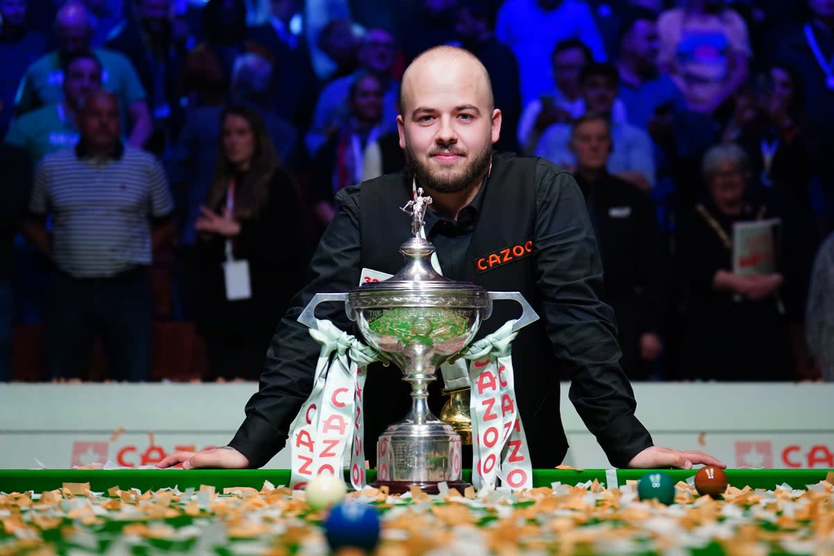 Luca Brecel won the World Snooker Championship title in Sheffield last year (PA Wire)