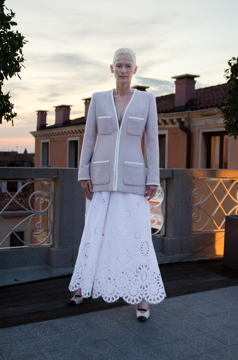 Tilda Swinton in Chanel couture spring 2022 at the 79th <a href="https://wwd.com/eye/people/lessons-in-perfect-timing-with-laura-harrier-engaged-1235333793/" rel="nofollow noopener" target="_blank" data-ylk="slk:Venice Film Festival;elm:context_link;itc:0;sec:content-canvas" class="link ">Venice Film Festival</a>.