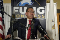 Republican Allan Fung, a former Cranston, R.I., mayor, addresses a crowd, Tuesday, Nov. 8, 2022, in Cranston, announcing that he is conceding defeat to Democrat Seth Magaziner in the race for a seat in the U.S. House of Representatives representing the state's 2nd Congressional District. (AP Photo/Steven Senne)