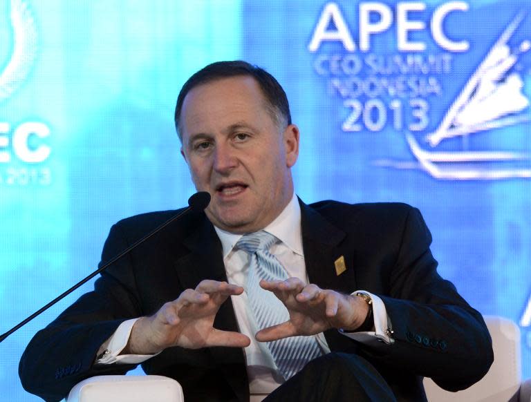 New Zealand Prime Minister John Key delivers an address at the Asia-Pacific Economic Cooperation Summit in Bali on October 6, 2013