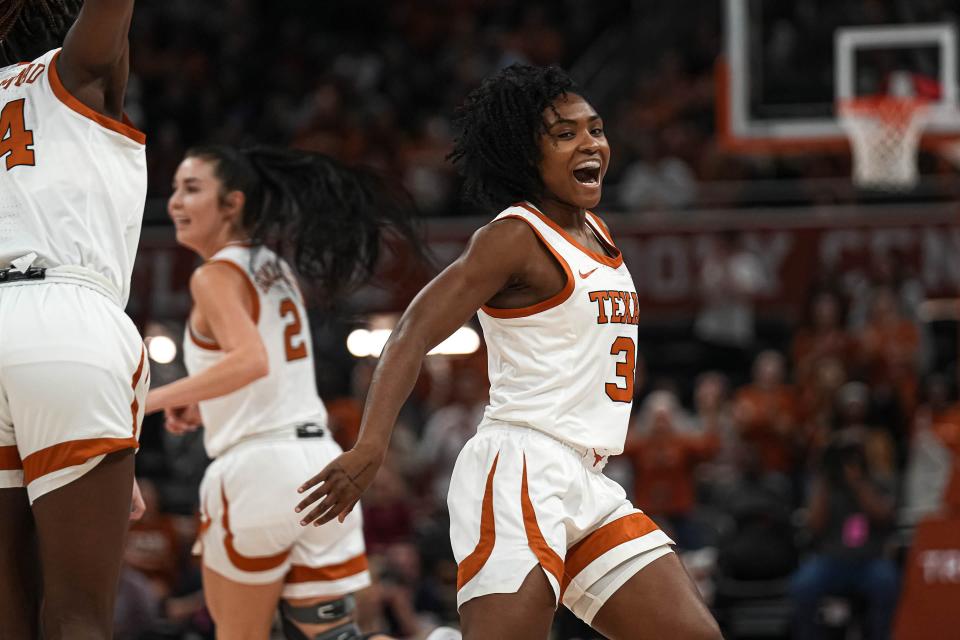 Texas point guard Rori Harmon celebrates a basket against UConn at Moody Center on Sunday. Harmon scored 27 points and had 13 assists in the Longhorns' 80-68 victory.