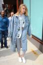 <p>Hadid paired her textured sweats with denim button-down + jacket combo, made all the more cheeky with a dinosaur print. </p>