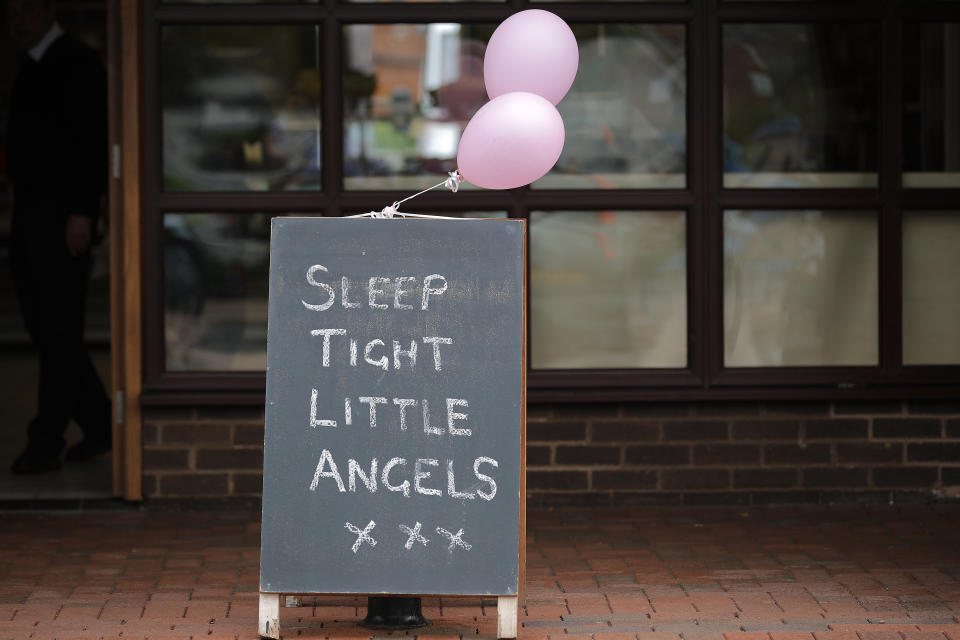 A sign outside a shop in the village of Tarleton, home of Georgina Callander, 18, and Saffie Rose Roussos, 8, who were killed in the Manchester attack.