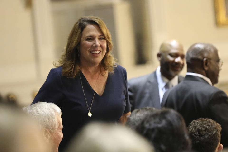 Newly elected South Carolina Supreme Court justice Letitia Verdin talks in the balcony of the state House before her election on Wednesday, June 5, 2024, in Columbia, S.C. Verdin's election means South Carolina traded its all-male Supreme Court for an all-white one. (AP Photo/Jeffrey Collins)