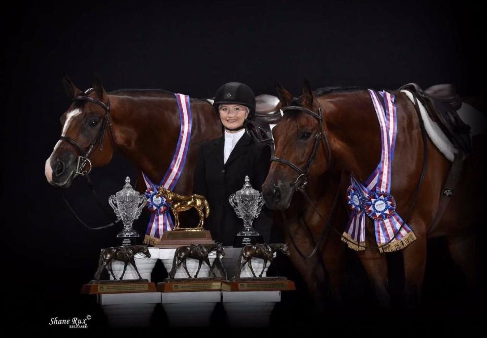 Karly Humbert poses with her horses Liam and Riggs.