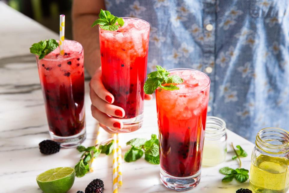 <p><a href="https://www.delish.com/uk/cocktails-drinks/a30924200/mojito/" rel="nofollow noopener" target="_blank" data-ylk="slk:Classic mojitos" class="link ">Classic mojitos</a> are always refreshing with fresh mint and fruit. This non-alcoholic version is still every bit as refreshing with an easy mint simple syrup and fresh blackberries. </p><p>Get the <a href="https://www.delish.com/uk/cocktails-drinks/a33333249/blackberry-virgin-mojito-recipe/" rel="nofollow noopener" target="_blank" data-ylk="slk:Blackberry Virgin Mojito" class="link ">Blackberry Virgin Mojito</a> recipe</p>