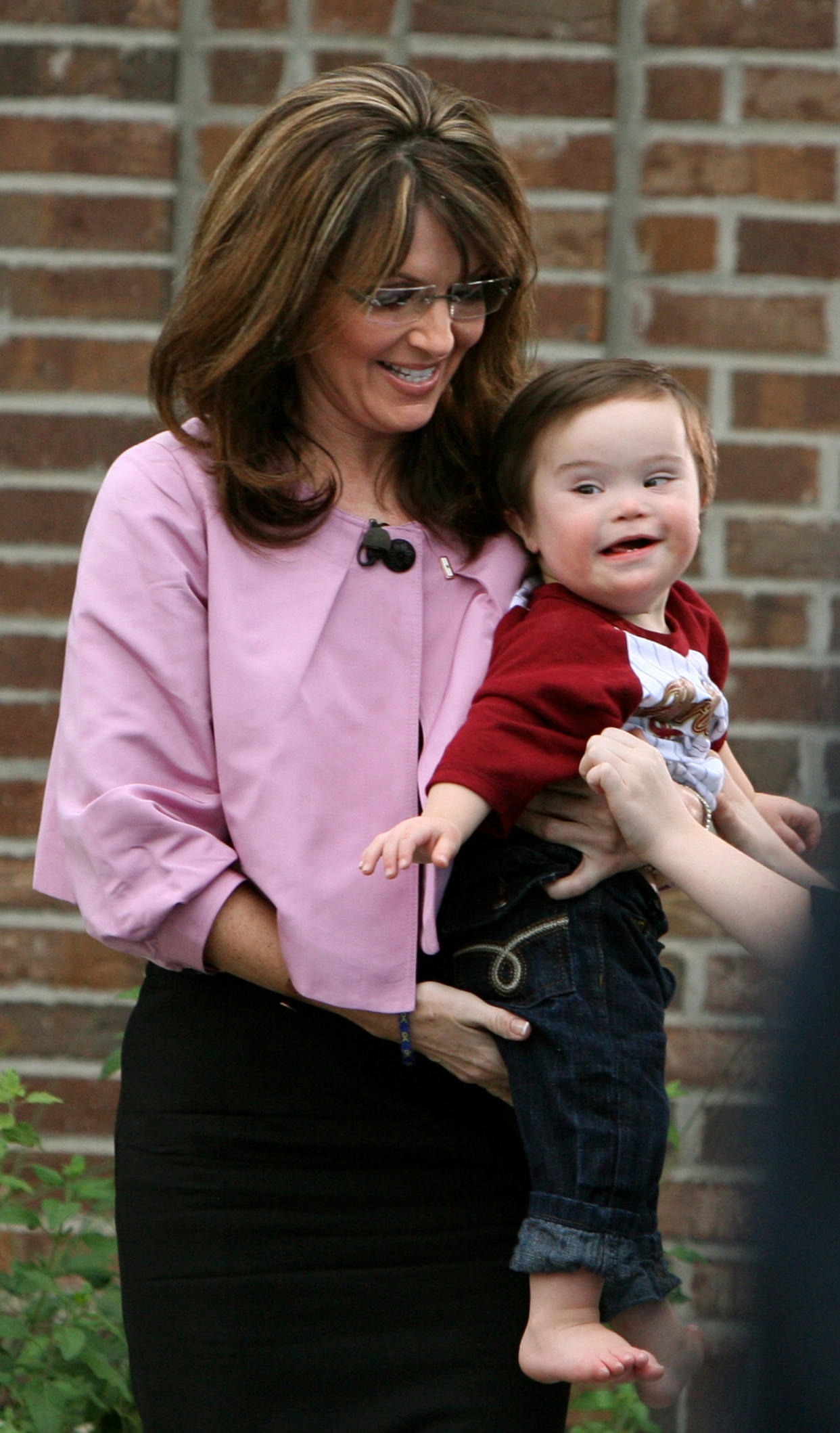 Former Alaska Gov. Sarah Palin, pictured with her son Trig in 2009, is accused of mocking people with Down syndrome in an Instagram post. (Photo: Getty Images)