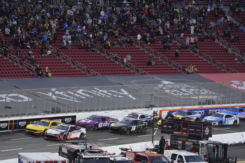 Cars race during the Busch Light Clash NASCAR exhibition auto race at Los Angeles Memorial Coliseum Saturday, Feb. 3, 2024, in Los Angeles. (AP Photo/Mark J. Terrill)