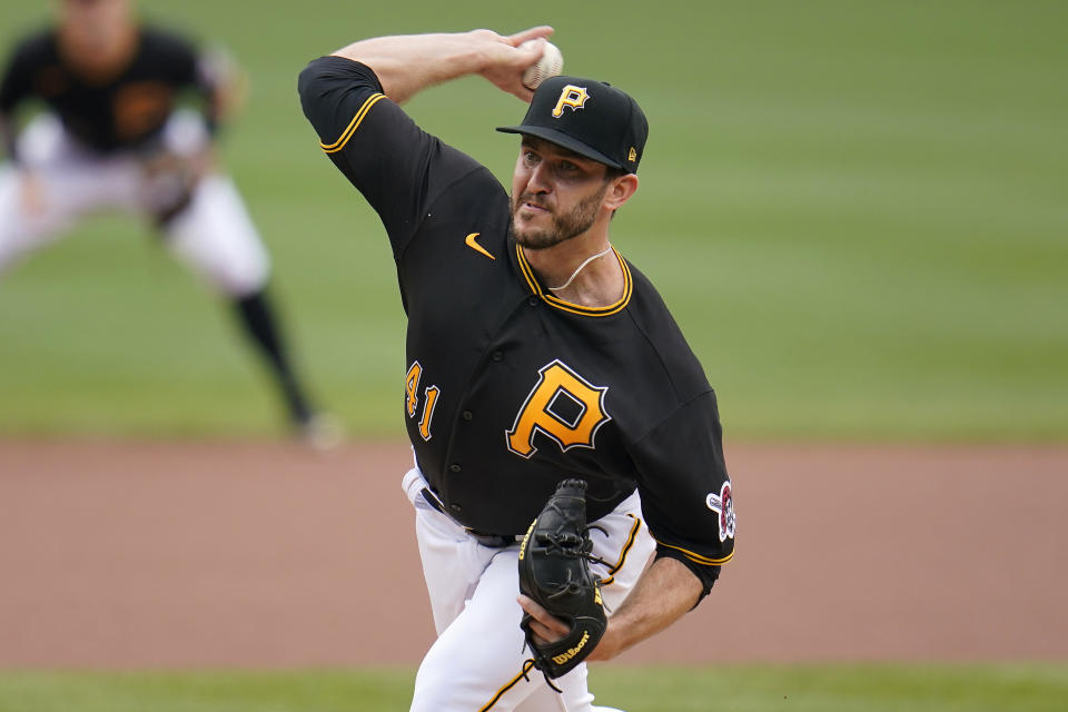Pittsburgh Pirates starting pitcher Connor Overton delivers during the first inning of a baseball game against the Cincinnati Reds in Pittsburgh, Thursday, Sept. 16, 2021. (AP Photo/Gene J. Puskar)