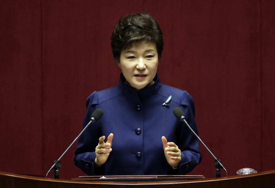 FILE - In this Nov. 18, 2013 file photo, South Korean President Park Geun-hye delivers a speech on the government budget at the National Assembly in Seoul, South Korea. A big question looms as the leaders of Japan and South Korea head to Europe next week: Will they finally meet? Friction over Japan's brutal colonization of Korea in the first half of the 20th century has prevented a summit between Japanese Prime Minister Shinzo Abe and South Korean President Park Geun-hye since they both took office more than a year ago. (AP Photo/Lee Jin-man, File)