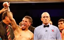 KISSIMMEE, FL - OCTOBER 19: Boxer Orlando Cruz celebrates victory over Jorge Pazos at Kissimmee Civic Center on October 19, 2012 in Kissimmee, Florida. (Photo by J. Meric/Getty Images)