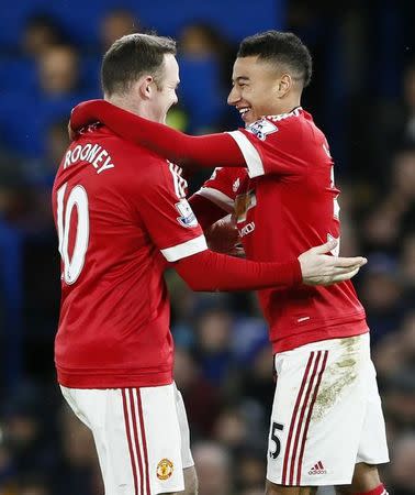 Football Soccer - Chelsea v Manchester United - Barclays Premier League - Stamford Bridge - 7/2/16 Manchester United's Jesse Lingard celebrates scoring their first goal with Wayne Rooney Reuters / Stefan Wermuth/Livepic