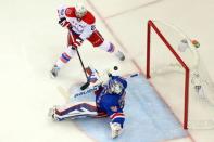 May 8, 2015; New York, NY, USA; Washington Capitals left wing Curtis Glencross (22) scores a goal against New York Rangers goalie Henrik Lundqvist (30) during the third period of game five of the second round of the 2015 Stanley Cup Playoffs at Madison Square Garden. Mandatory Credit: Brad Penner-USA TODAY Sports