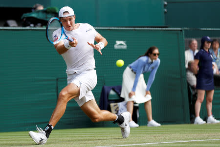 FILE PHOTO: Tennis - Wimbledon - All England Lawn Tennis and Croquet Club, London, Britain - July 6, 2018. Germany's Jan-Lennard Struff in action during the third round match against Switzerland's Roger Federer. REUTERS/Peter Nicholls/File Photo