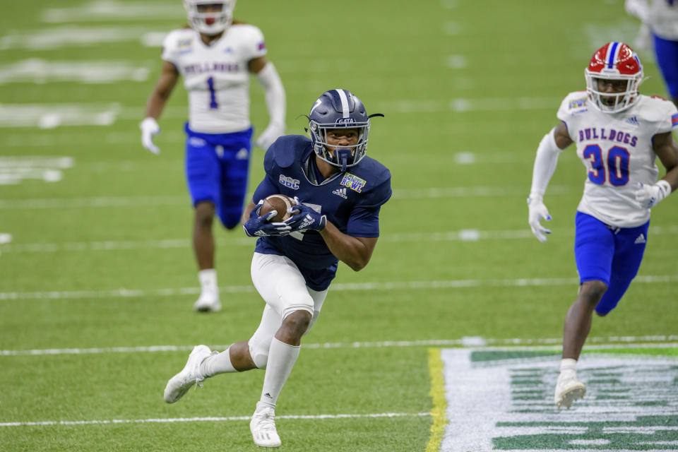 Georgia Southern wide receiver Khaleb Hood (7) scores a touchdown against Louisiana Tech during the first half of the New Orleans Bowl NCAA college football game in New Orleans, Wednesday, Dec. 23, 2020. (AP Photo/Matthew Hinton)