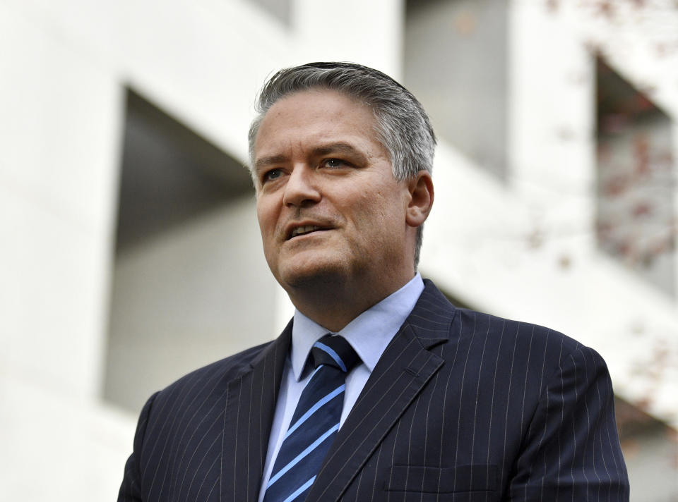 Australian Finance Minister Mathias Cormann speaks during a press conference at Parliament House in Canberra, Monday, May 28, 2018. The Australian government announced Monday that the Senate will vote in June on cutting corporate tax rates after an opinion poll suggested the contentious reform had popular public support. Cormann, the government's chief negotiator in the Senate, said that senators will be asked to vote on the tax cuts when they next sit from June 18 to 28. (Mick Tsikas/AAP Images via AP)
