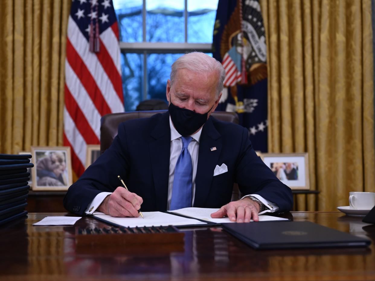 Biden rejoins Paris Climate Agreement (AFP via Getty Images)