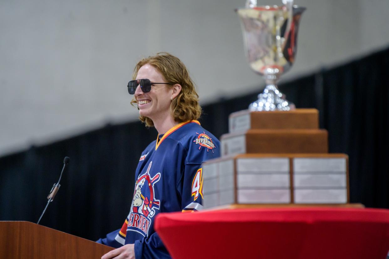 JM Piotrowski of the Peoria Rivermen flashes a smile as he speaks to fans during a public celebration for the team's SPHL President's Cup hockey championship Friday, May 3, 2024 at the Peoria Civic Center.