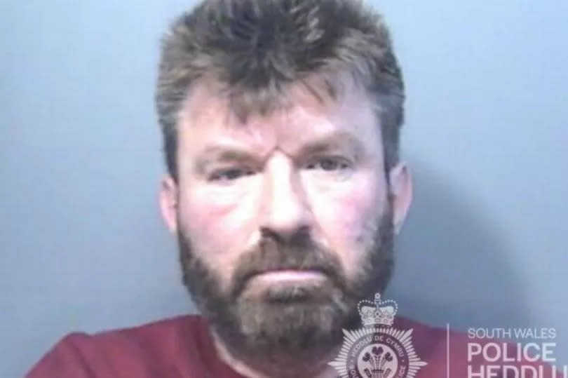 Police custody photograph of Rhys Phillips