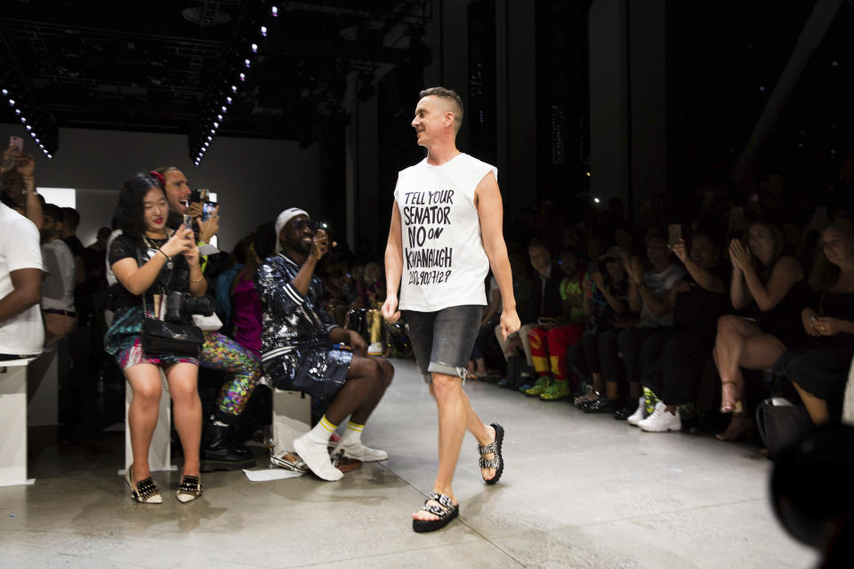 Fashion designer Jeremy Scott appears at the finale of the presentation of his spring 2019 collection during Fashion Week in New York, Thursday, Sept. 6, 2018. (AP Photo/Kevin Hagen)