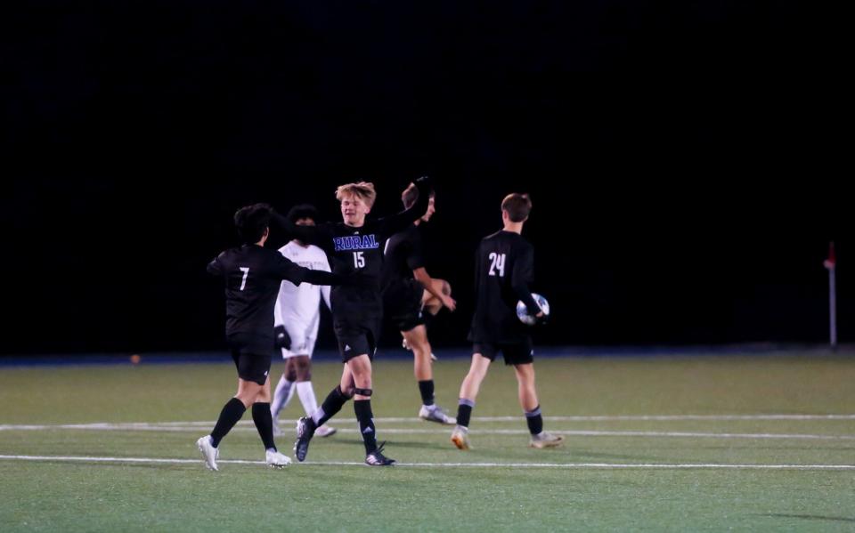 Washburn Rural's Lawsen Lobatos-Dick and Hayden Shriver celebrate after first half goal against Garden City in the Class 6A State Quarterfinal on Tuesday, Oct. 31.