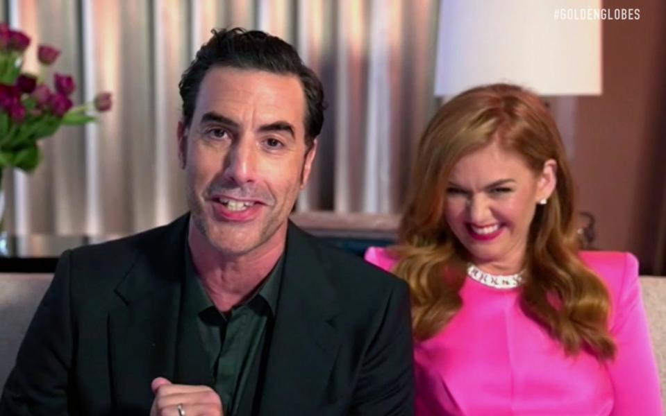 Winner Sacha Baron Cohen celebrates with his wife Isla Fisher - Getty Images