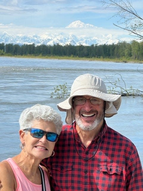 Nicole, 71, and Larry, 69, Kramer, of Scituate, felt fortunate to have sunny days and temperatures near 70 for much of their Alaskan trip in June 2023. Denali is in the background.