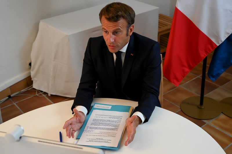 French President Emmanuel Macron speaks during a donor teleconference with other world leaders, in Bormes-les-Mimosas