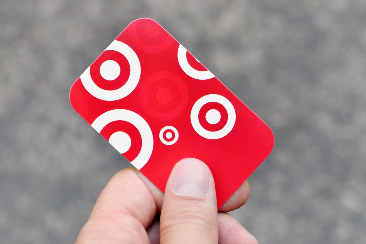 hand holding Target gift card