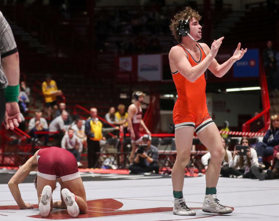 Kaukauna's Kolin DeGroot reacts after defeating Menomonie's Luke Pember in a 150-pound match during a Division 1 semifinal dual at the WIAA team state wrestling tournament Friday in Madison.
