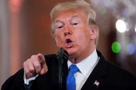 U.S. President Donald Trump takes a question during a news conference following Tuesday's midterm congressional elections at the White House in Washington, U.S., November 7, 2018. REUTERS/Kevin Lamarque