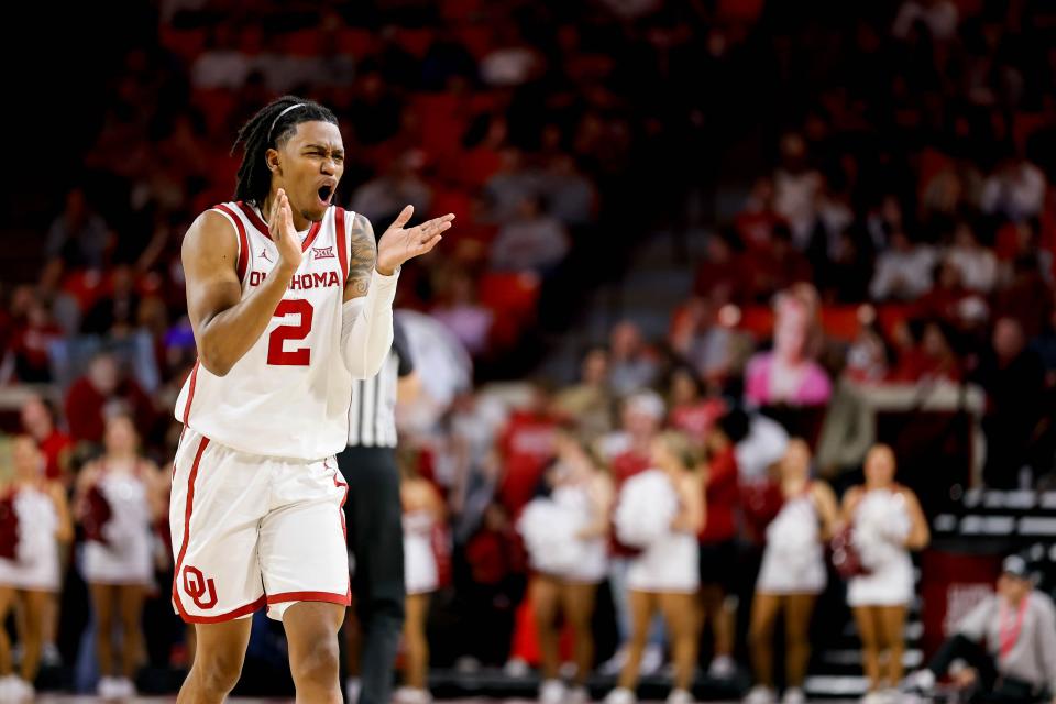 Oklahoma guard Javian McCollum (2) yells to get the attention of head coach Porter Moser in the second half against Iowa State on Saturday at Lloyd Noble Center in Norman.