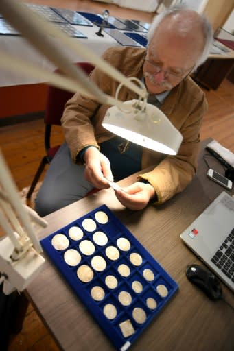 Archaeologist and coin expert Ferenc Redo says almost half of the coins are from the Roman era
