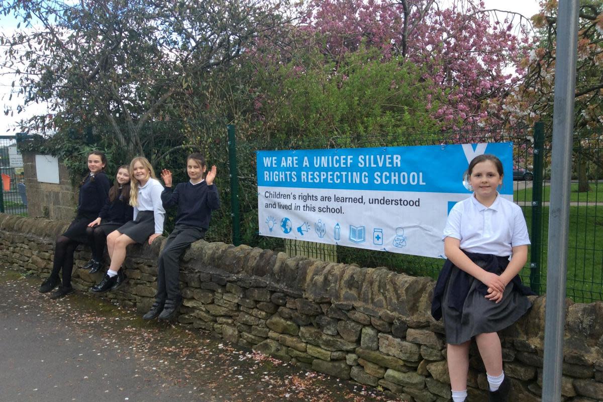 Glusburn schoolchildren with the school's new UNICEF banner <i>(Image: Glusburn School)</i>