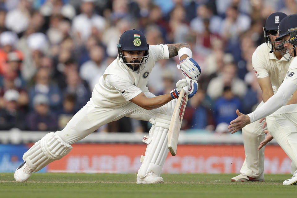 India captain Virat Kohli hits a shot during the fifth cricket test match of a five match series between England and India at the Oval cricket ground in London, Saturday, Sept. 8, 2018. (AP Photo/Matt Dunham)