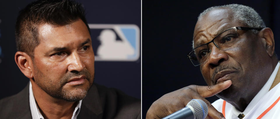 FILE - At left, in a Dec. 9, 2019, file photo, Washington Nationals manager Dave Martinez listens to a question during the Major League Baseball winter meetings in San Diego. At right, in a Jan. 30, 2020, file photo, Dusty Baker answers questions during a news conference as he is announced as the new Houston Astros manager, at Minute Maid Park in Houston. It will be the champs vs. the cheaters on Saturday night, Feb. 22, 2020, when the Nationals and Astros meet in their exhibition opener. The last time these teams played the Nationals were celebrating their World Series title in Houston. Since then the Astros have become the league's villains, with a sign-stealing scandal tarnishing their reputation and casting a shadow on their 2017 title. (AP Photo/File)