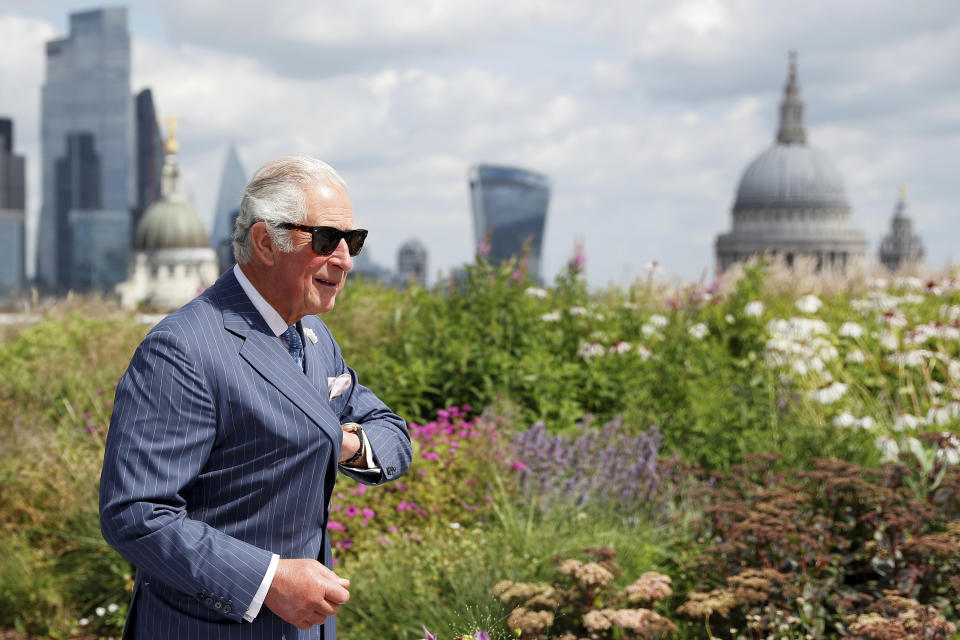 FILE - In this July 14, 2021 file photo, Britain's Prince Charles visits the Goldman Sachs Head Quarters, backdropped by the city of London. Prince Charles has been preparing for the crown his entire life. Now, that moment has finally arrived. Charles, the oldest person to ever assume the British throne, became king on Thursday Sept. 8, 2022, following the death of his mother, Queen Elizabeth II. (Peter Nicholls/Pool via AP, File)