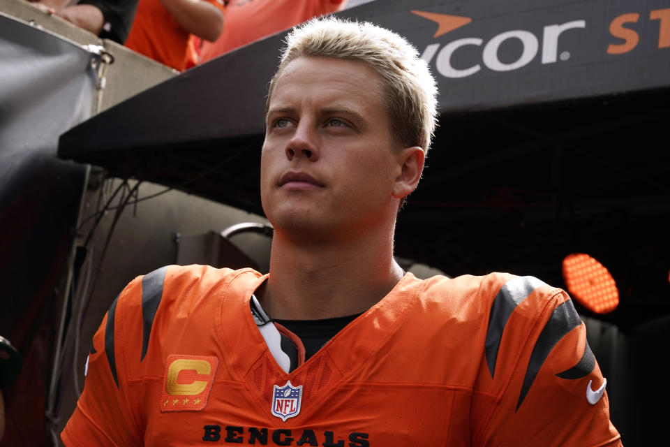 Cincinnati Bengals quarterback Joe Burrow waits to run onto the field before an NFL football game against the New England Patriots, Sunday, Sept. 8, 2024, in Cincinnati. (AP Photo/Jeff Dean)