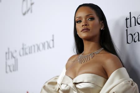 Singer Rihanna poses at the second annual Diamond Ball fundraising event in Santa Monica, California December 10, 2015. REUTERS/Mario Anzuoni