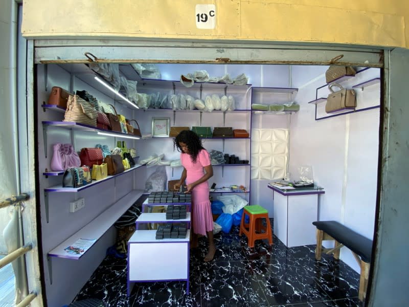 Lagos based entreprenuer Ogechi Egemonu is seen arranging items inside her office in Lagos