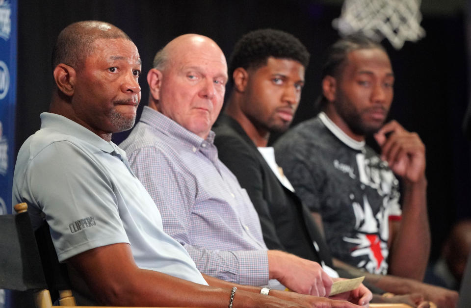 LOS ANGELES, CA - JULY 24: From left, Clippers head coach Doc Rivers, owner Steve Ballmer, Paul George and Kawhi Leonard gather for a press conference at the Green Meadows Recreation Center in Los Angeles on Wednesday, July 24, 2019. George and Leonard were introduced to the media and fans as the newest members of the Clippers. (Photo by Scott Varley/MediaNews Group/Daily Breeze via Getty Images)