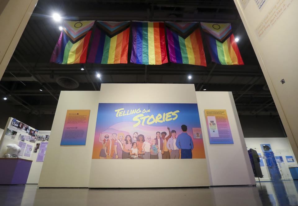 The entrance to the "Telling Our Stories" exhibit is seen on Thursday at the Neville Public Museum in Green Bay. The exhibit highlights the LGBTQ+ community's history in the Green Bay area.