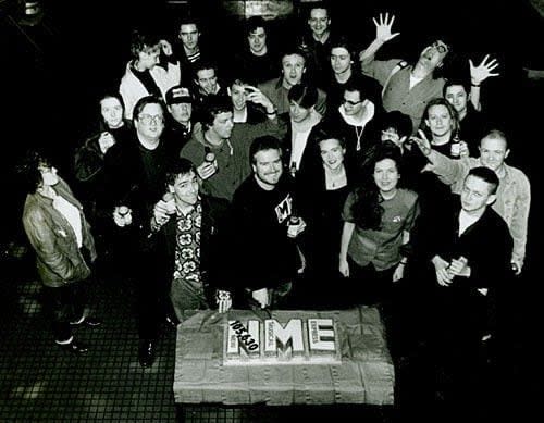 Lewis with the NME staff in the late 1980s celebrating a rise in circulation