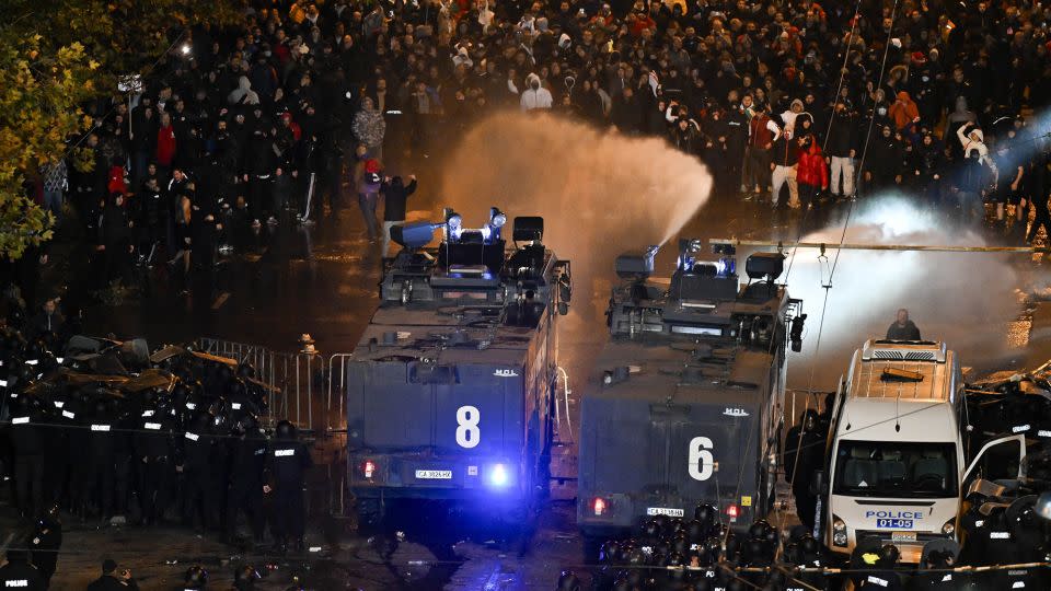 Police use water cannons to disperse fans outside the Vassil Levski Stadium in Sofia on November 16. - Nikolay Doychinov/AFP/Getty Images