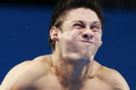 Ukraine's Illya Kvasha performs a dive during the men's 3m springboard preliminary round at the London 2012 Olympic Games at the Aquatics Centre August 6, 2012. REUTERS/Tim Wimborne (BRITAIN - Tags: SPORT DIVING OLYMPICS SPORT SWIMMING) 