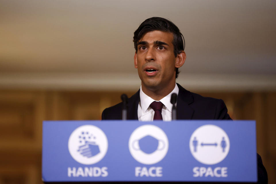 Britain's Chancellor of the Exchequer Rishi Sunak holds a virtual news conference in Downing Street, London, Thursday Sept. 24, 2020. Britain’s treasury chief has announced a new income support program for workers hurt by the coronavirus pandemic as the government races to prevent widespread layoffs when earlier employer subsidies end next month. (John Sibley/Pool via AP)