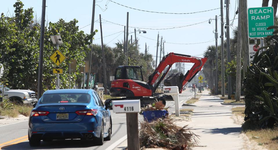 Heavy construction equipment rumbles up the beach ramp toward South Atlantic Avenue in hard-hit Wilbur-by-the-Sea. A year after Tropical Storm Nicole, the process to repair amenities such as pools and decks and been slow-moving, according to one contractor involved in those projects.