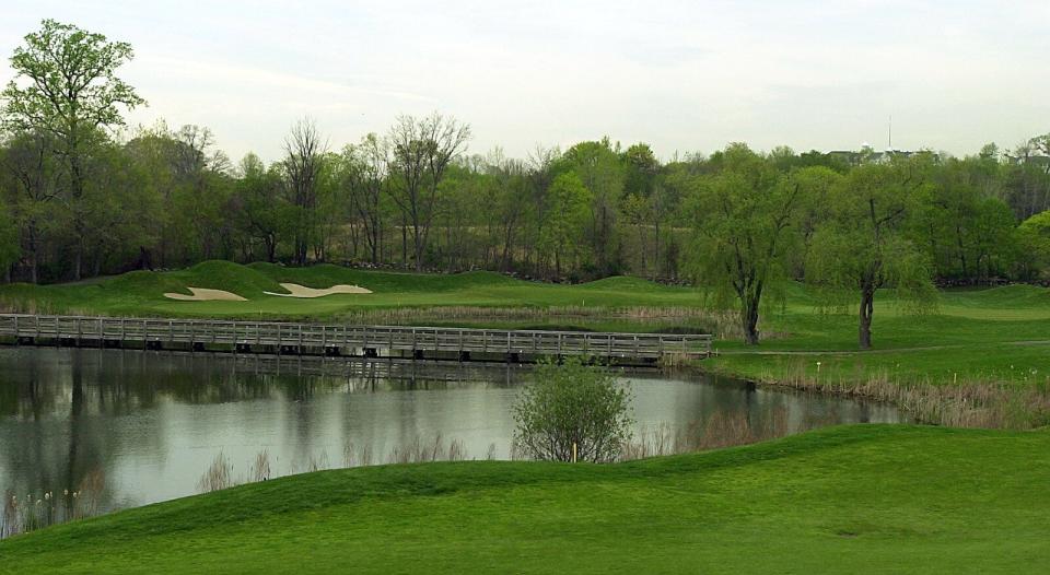 In this 2002 file photo, a wooden bridge crosses a pond between the tee and green at Doral Arrowwood in Rye Brook.