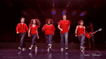 Kurt, Rachel, Mercedes, Finn, Tina, and Artie performing "Don't Stop Believin'"